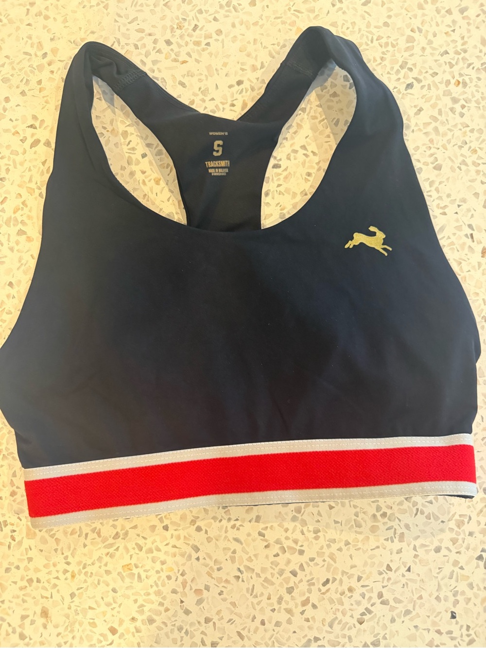 Tracksmith Black Sports Bra with Red and White Stripe Band